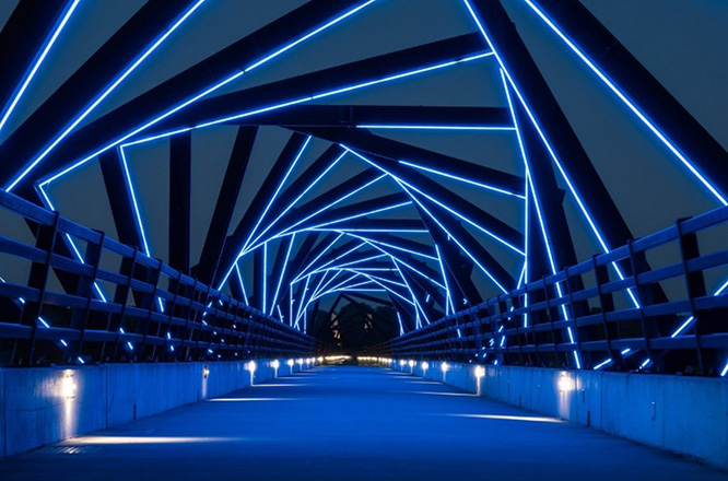 High Trestle Trail Bridge lit up at night