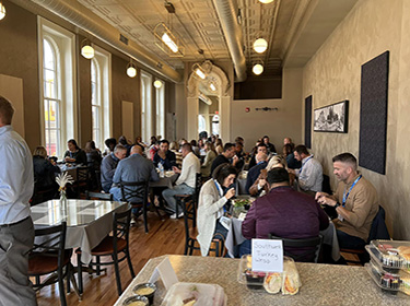People dine in a newly restored restuarant