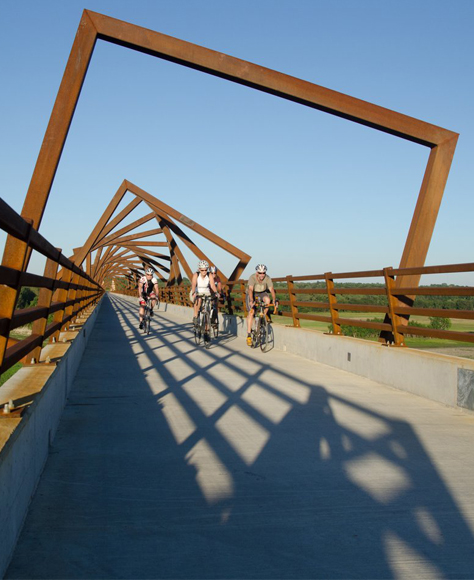 Bicycle riders on the 25 mile High Trestle Trail
