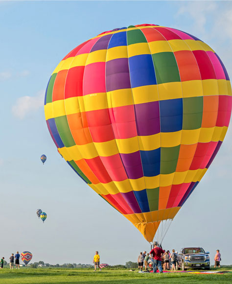 A hot air balloon filling up and preparing for takeoff