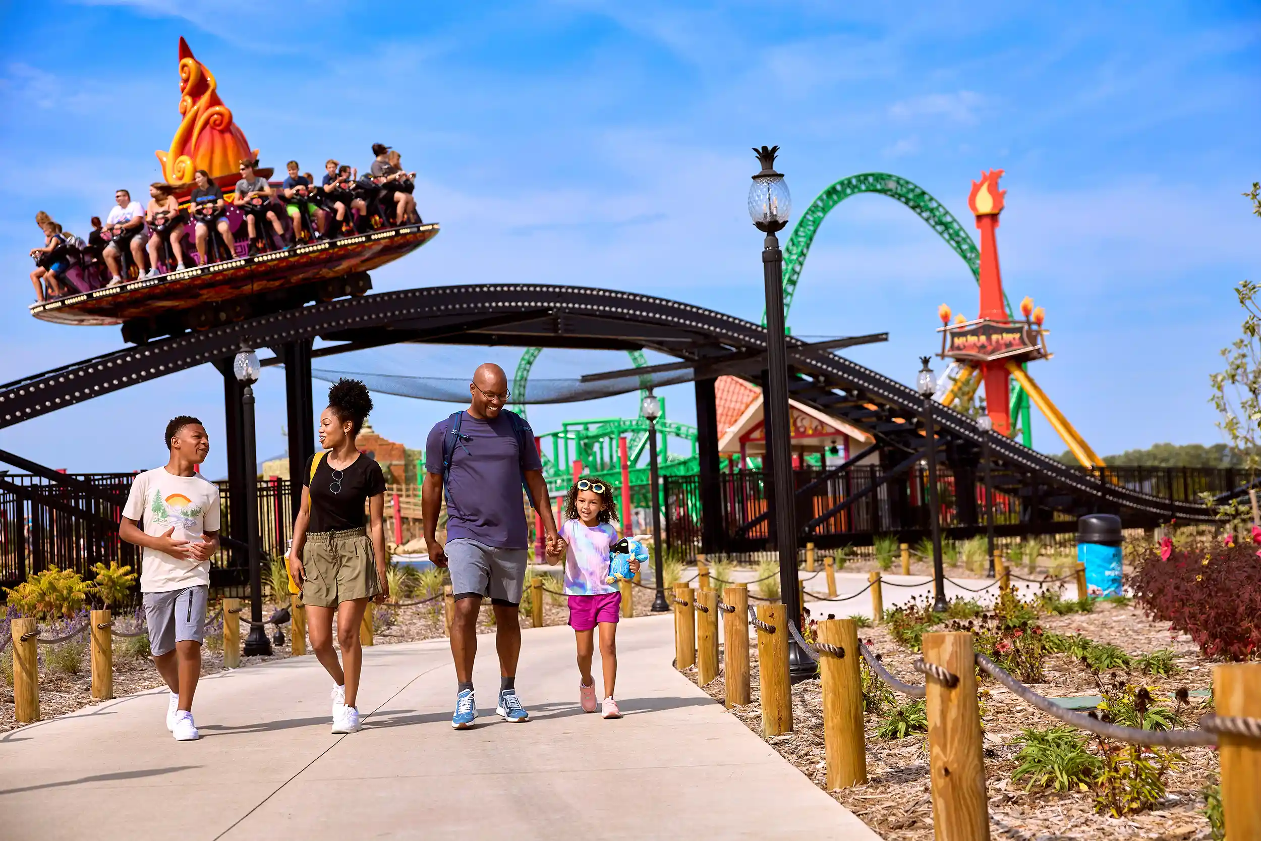 Family walking through an amusement park