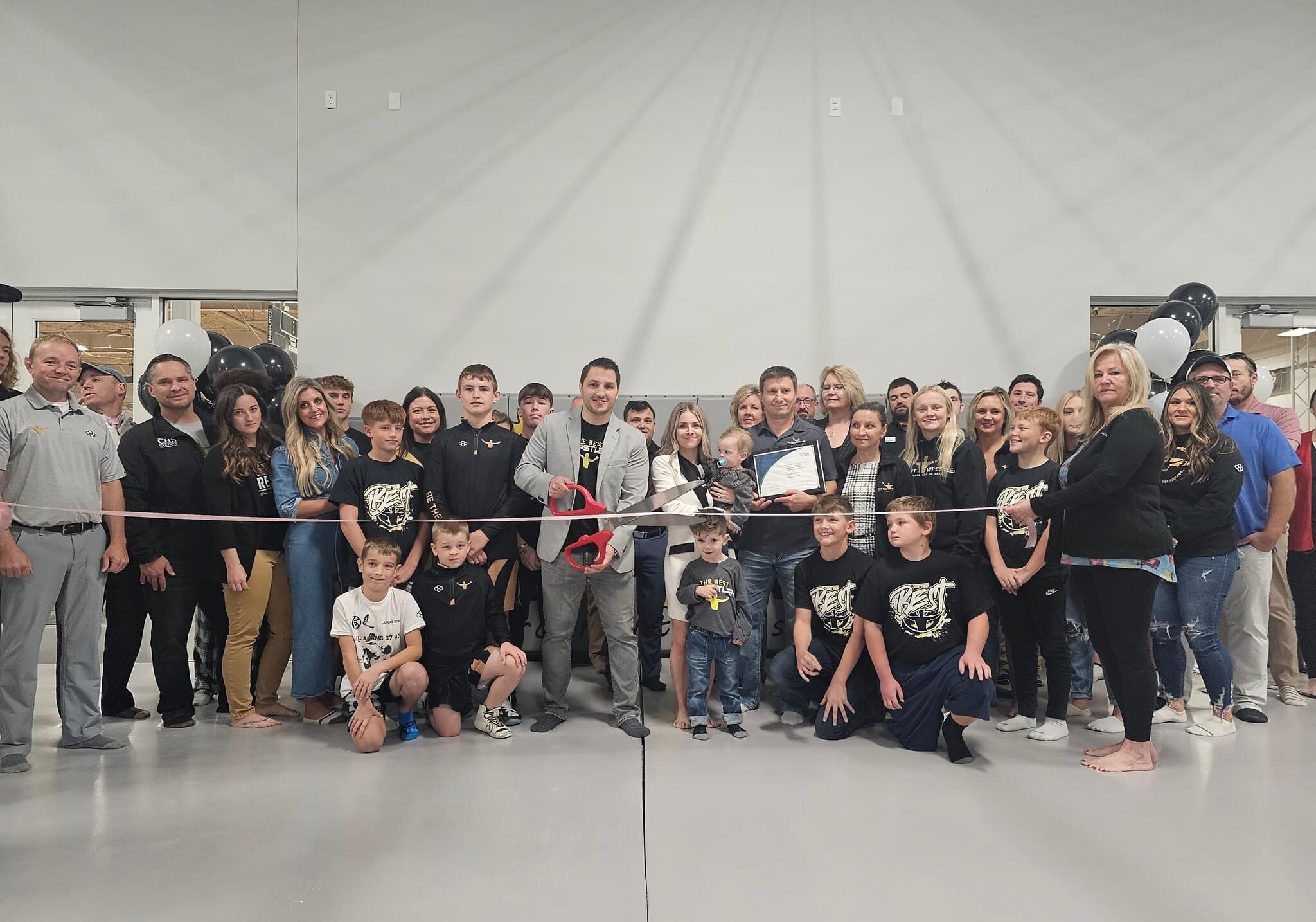 Ribbon cutting at The Best Wrestler facility
